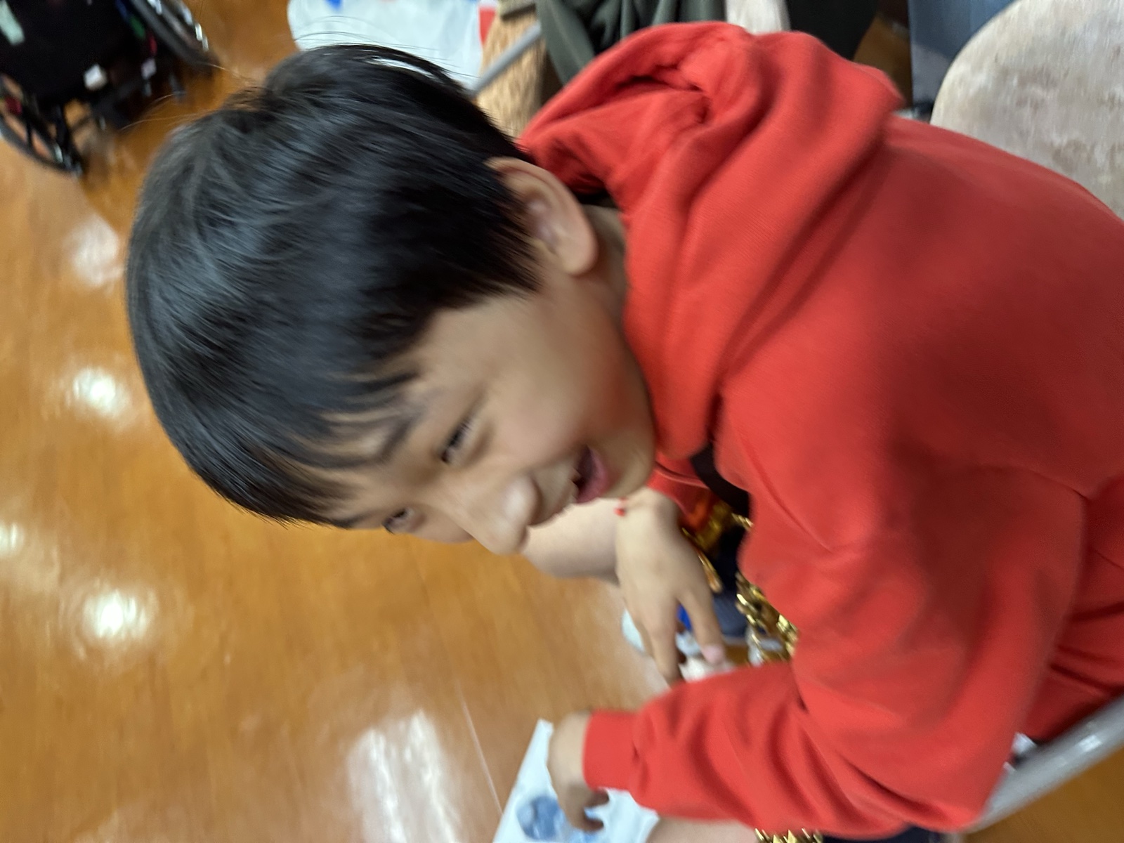 A young SEIVN volunteer smiling between activities